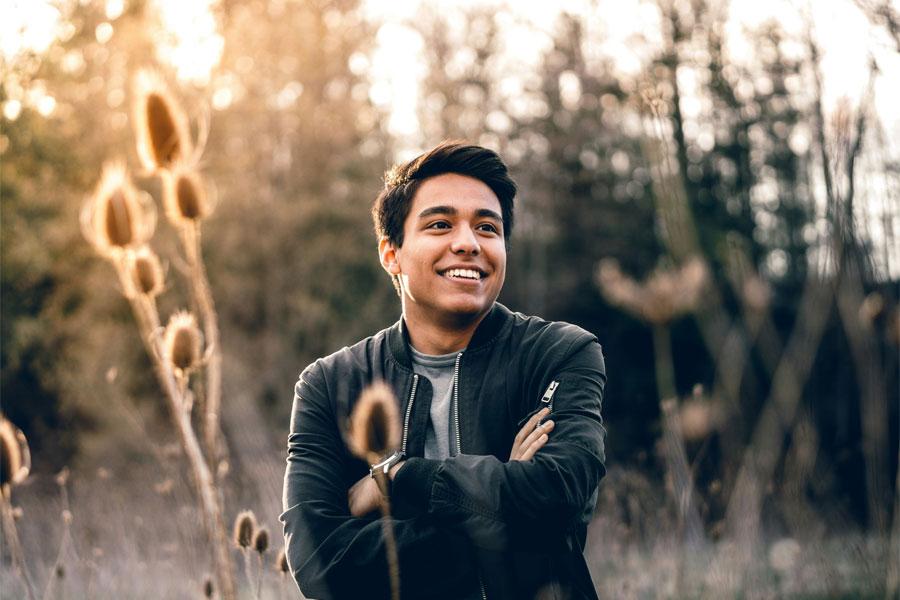 A young boy smiling.