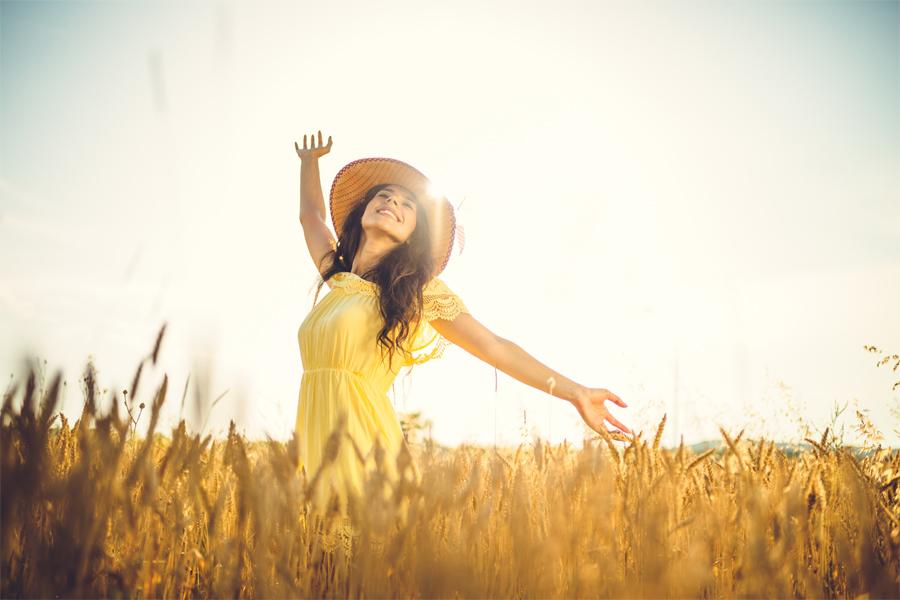 A beautiful girl smiling while spreading her hands